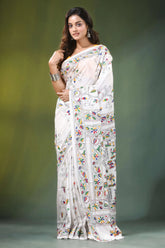 White handmade folk art motif silk kantha stitch saree adorned intricate colorful 6