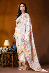 White multi-thread geometric motif hand embroidered lambani silk saree woman wears off-white silk saree 4