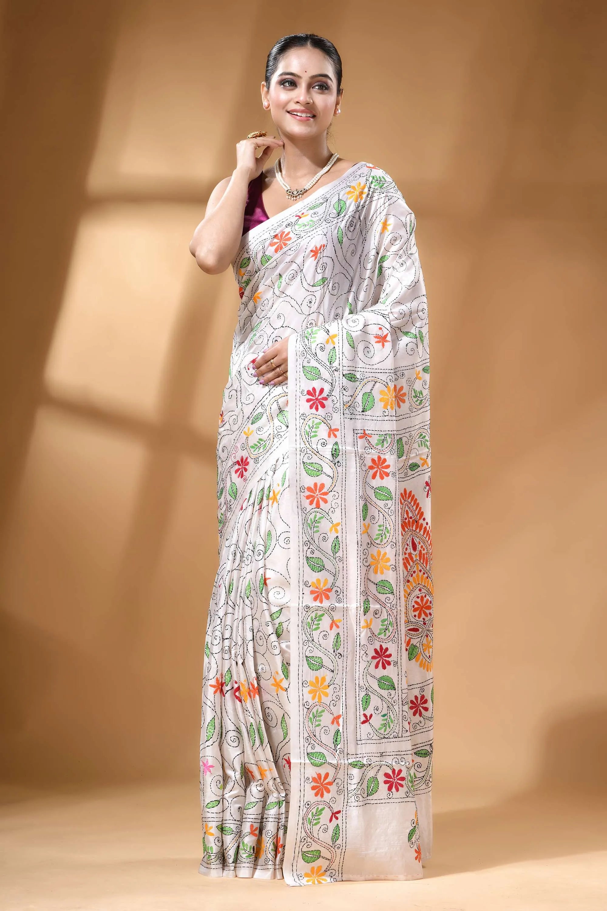 White paisley design handcrafted silk kantha stitch saree woman wears white silk saree 7