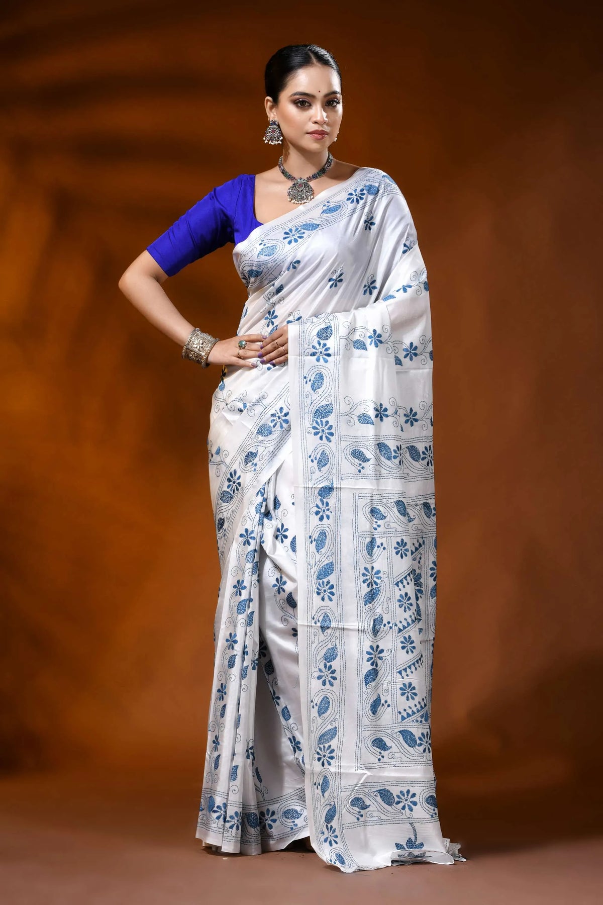 White silk kantha stitch saree with blue paisley floral motif 1
