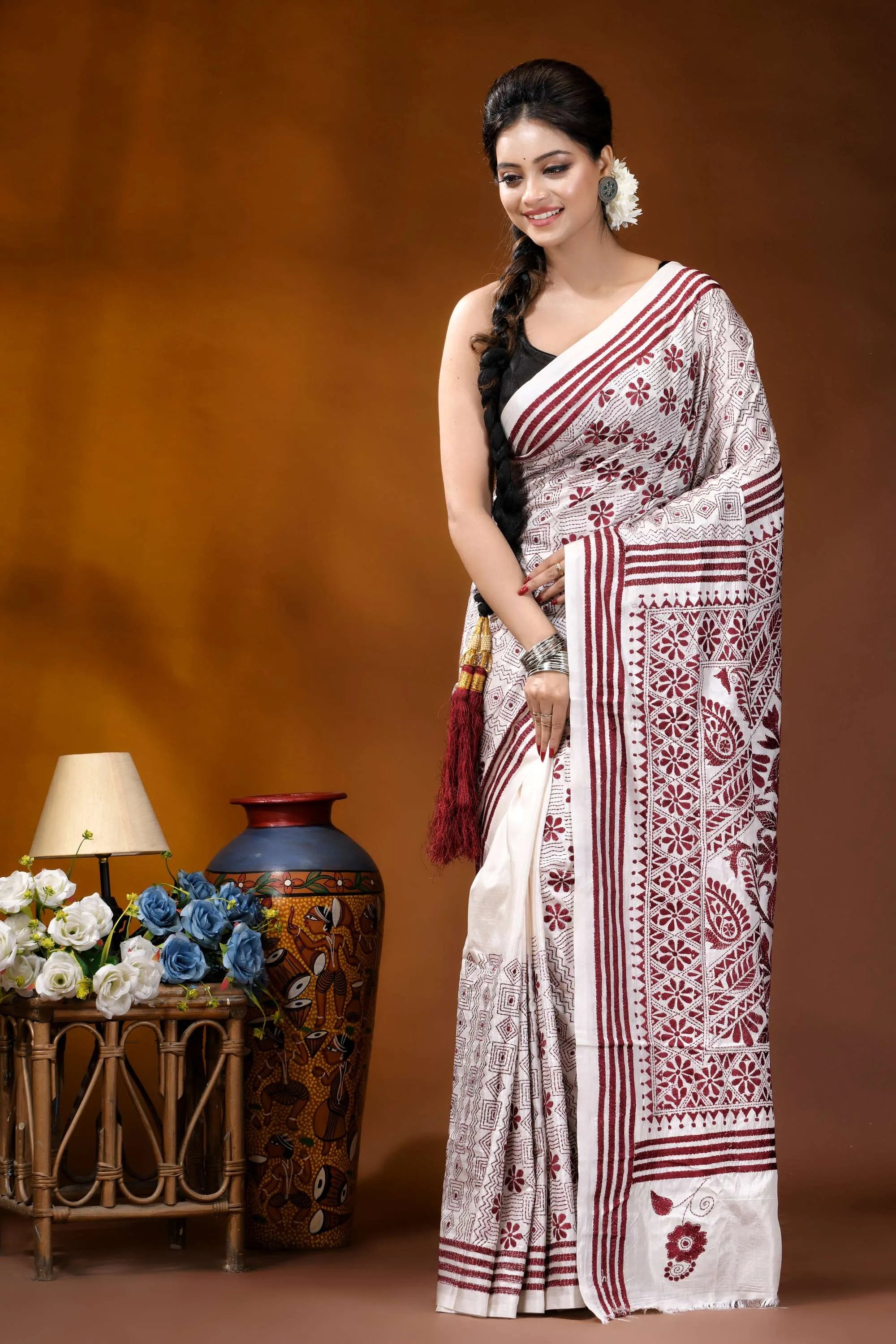 Wine color thread work floral motif handcrafted silk kantha saree in white woman wears white maroon patterned 6