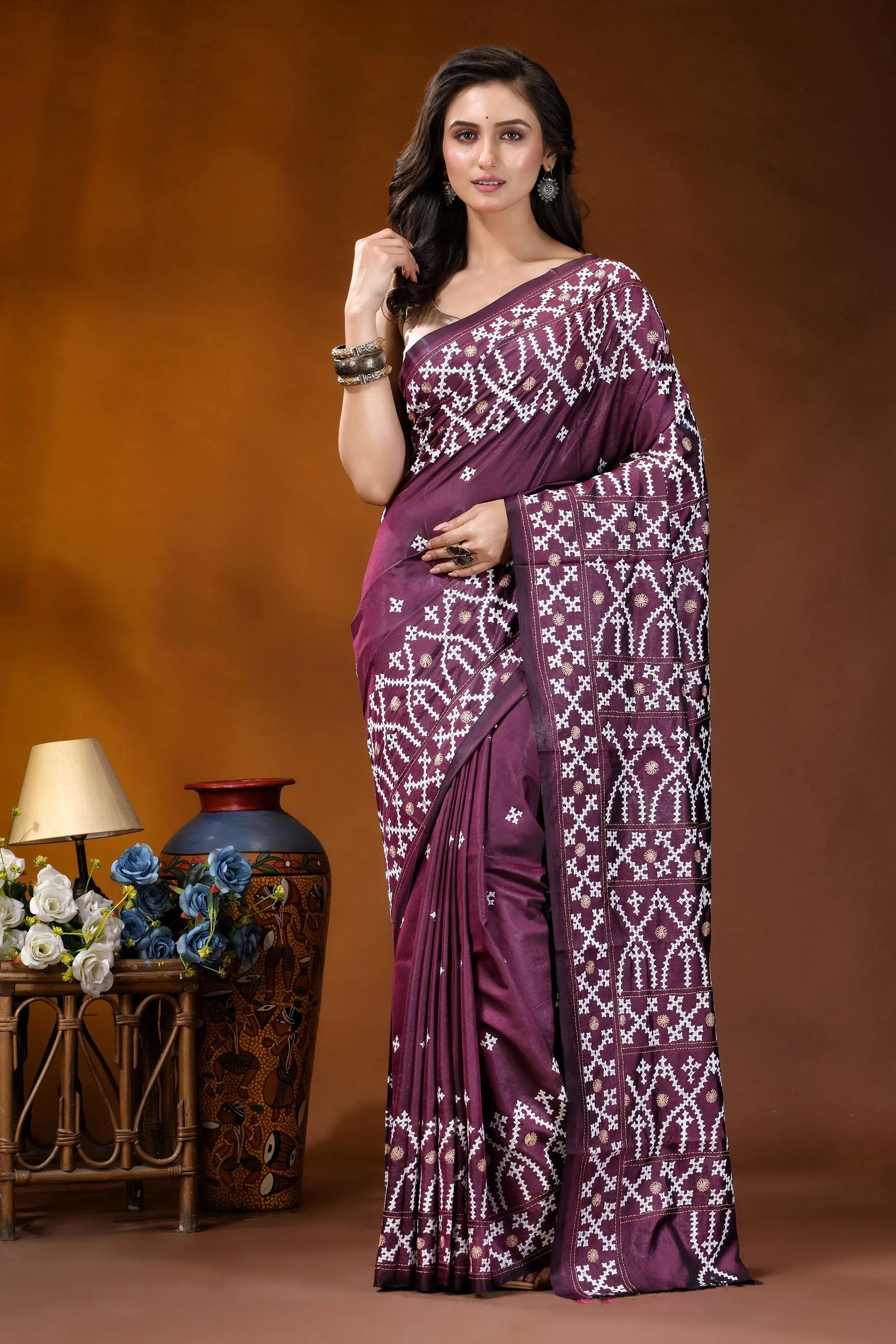 Wine ethnic motif handcrafted kutch embroidery silk saree woman wears deep purple saree 1