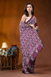 Wine ethnic motif handcrafted kutch embroidery silk saree woman wears rich purple saree 4