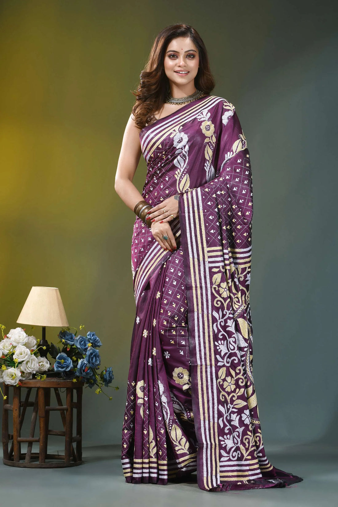 Wine purple floral heritage hand embroidery silk kantha saree woman wears rich purple saree 1