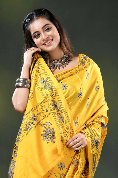 Yellow silk kantha stitch saree with hand embroidered floral motif 2