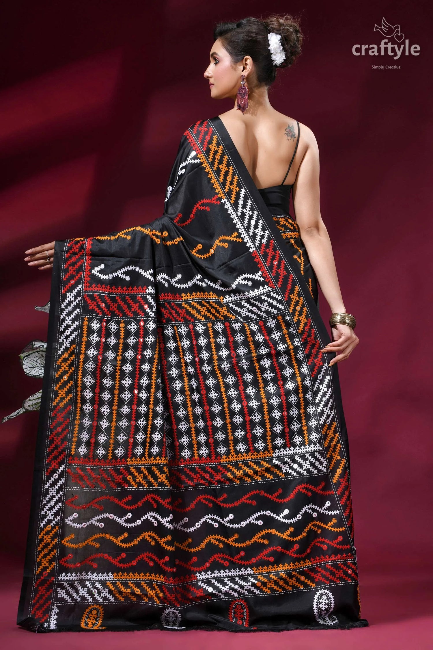 Zade black intricate gujrati stitched silk saree with mirror work black silk saree intricate geometric 4