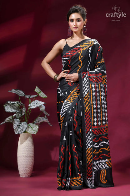 Zade black intricate gujrati stitched silk saree with mirror work black saree intricate red white 1